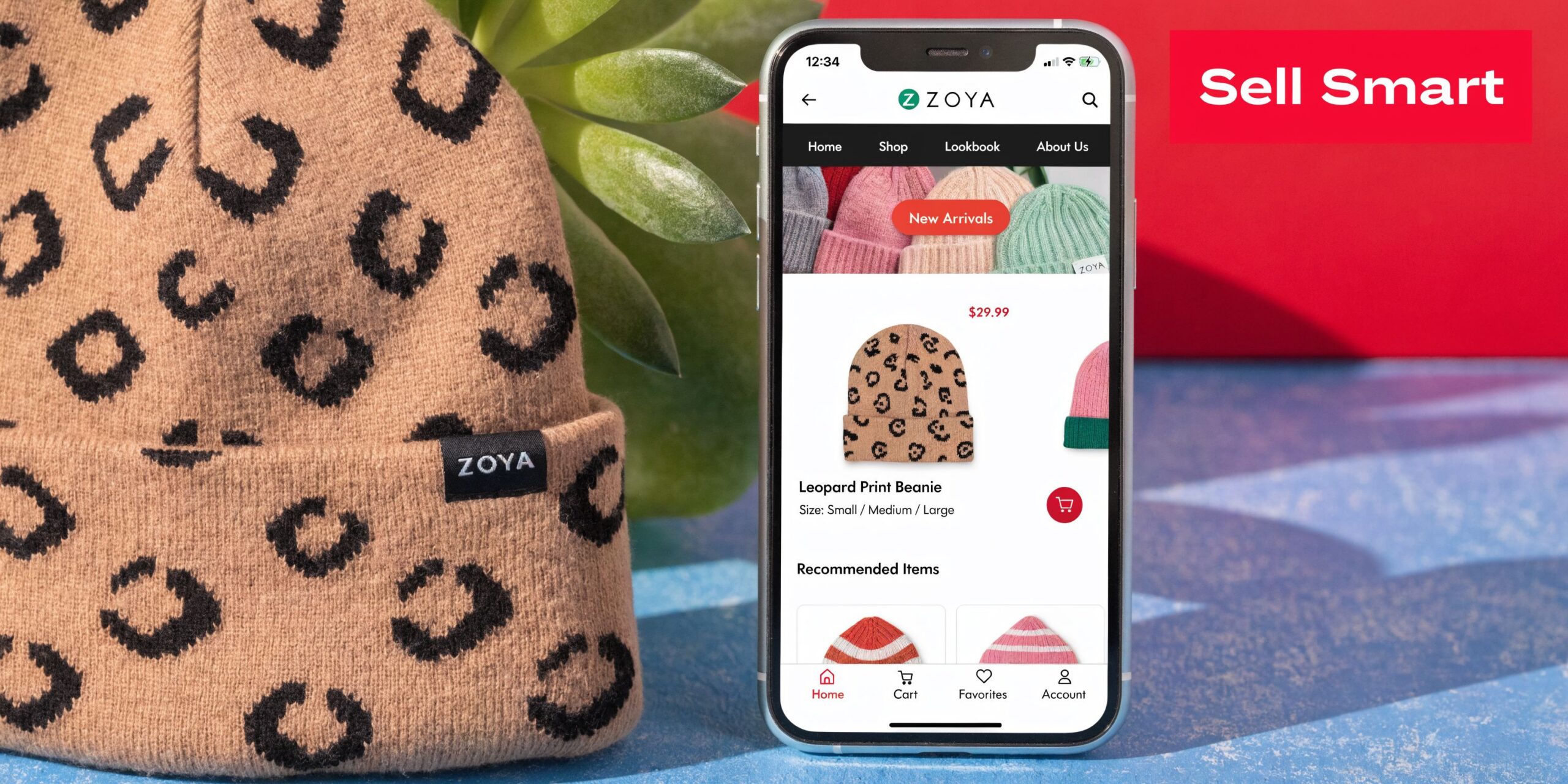 A smartphone displaying a shopping app with a leopard print beanie beside a physical matching beanie hat.